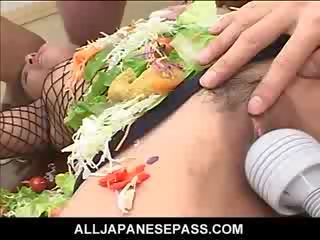 Jap AV doll turned into an edible table for concupiscent blokes
