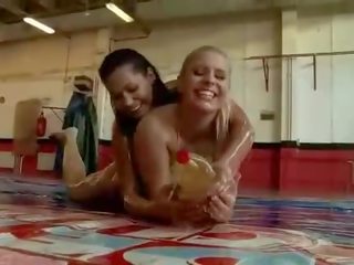 Oiled girls fighting and having swell sex clip